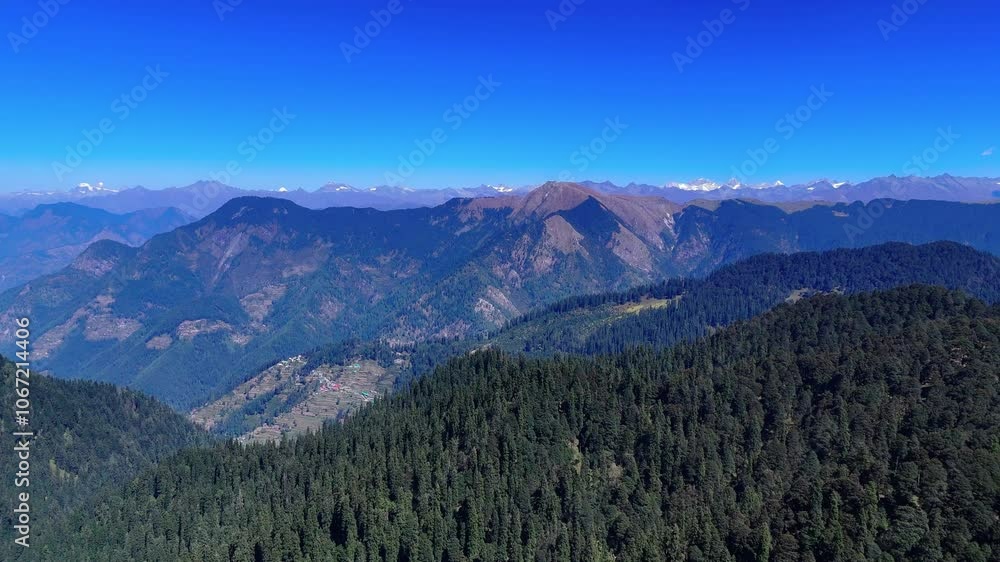 drone video of A scenic mountain valley with tall trees and green forests in himachal drone video of A scenic mountain valley with tall trees and green forests in himachal