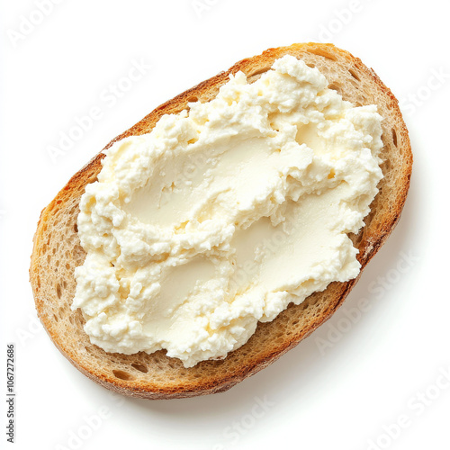 A soft ricotta cheese spread evenly on bread, isolated on a white background, showing a rich, creamy consistency