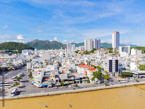 The river after the rains.

The Kai River in Nha Trang in Vietnam is filled with water after rains and has the color of silt. Mid-October. Shooting from a drone.
