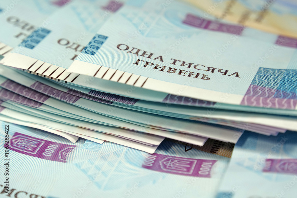 Banknotes 1000 Hryvnia. Real Ukrainian paper money of blue yellow color Banknotes 1000 Hryvnia. Real Ukrainian paper money of blue yellow color