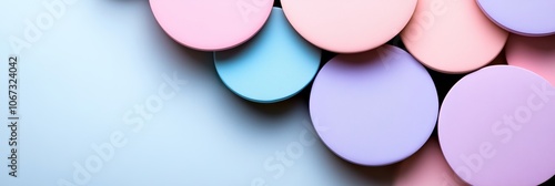 Circular Pastel Shapes Overlapping on Light Blue Background