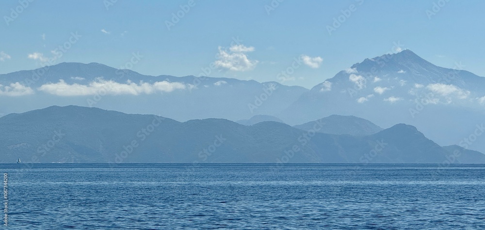 Beautiful landscape of mountains with clouds around the mountains Fethiye Gulf in Turkey