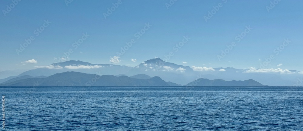 Beautiful landscape of mountains with clouds around the mountains Fethiye Gulf in Turkey