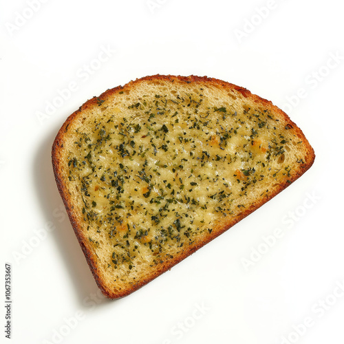 A slice of garlic bread with visible herbs, isolated on a white background, emphasizing a flavorful side photo