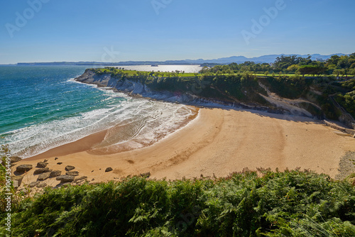 Sunny day on a Matalenas Beach in Santader, Spain photo