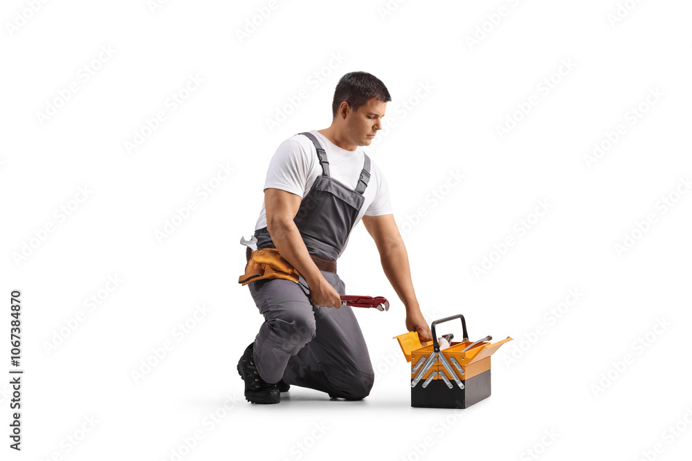 Repairman with a tool box and pliers Repairman with a tool box and pliers