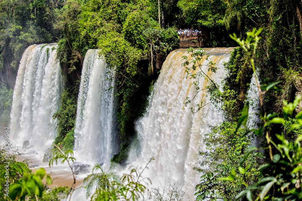 Naklejka premium Group of tourists visiting Iguazu Falls, Misiones, Argenina