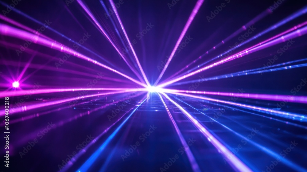 Fototapeta premium A vibrant display of colorful laser beams creating a dynamic visual effect.