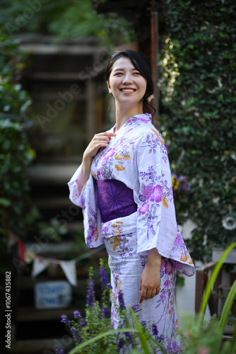 portrait woman with yukata dress in the garden