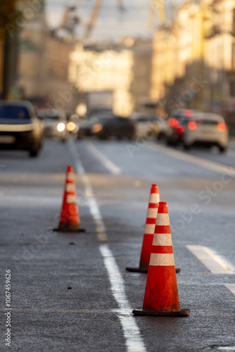 Street repair works. Construction cones on the road.