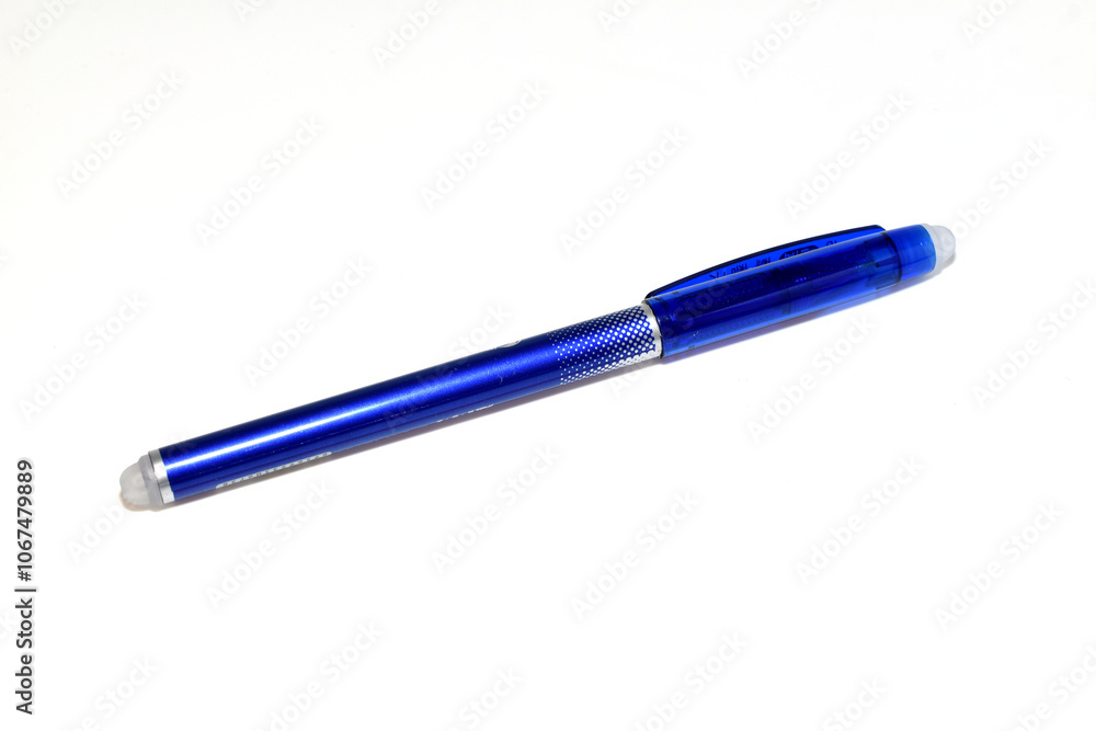 A fountain pen with an eraser that erases its own blue ink. A fountain pen with an eraser that erases its own blue ink.