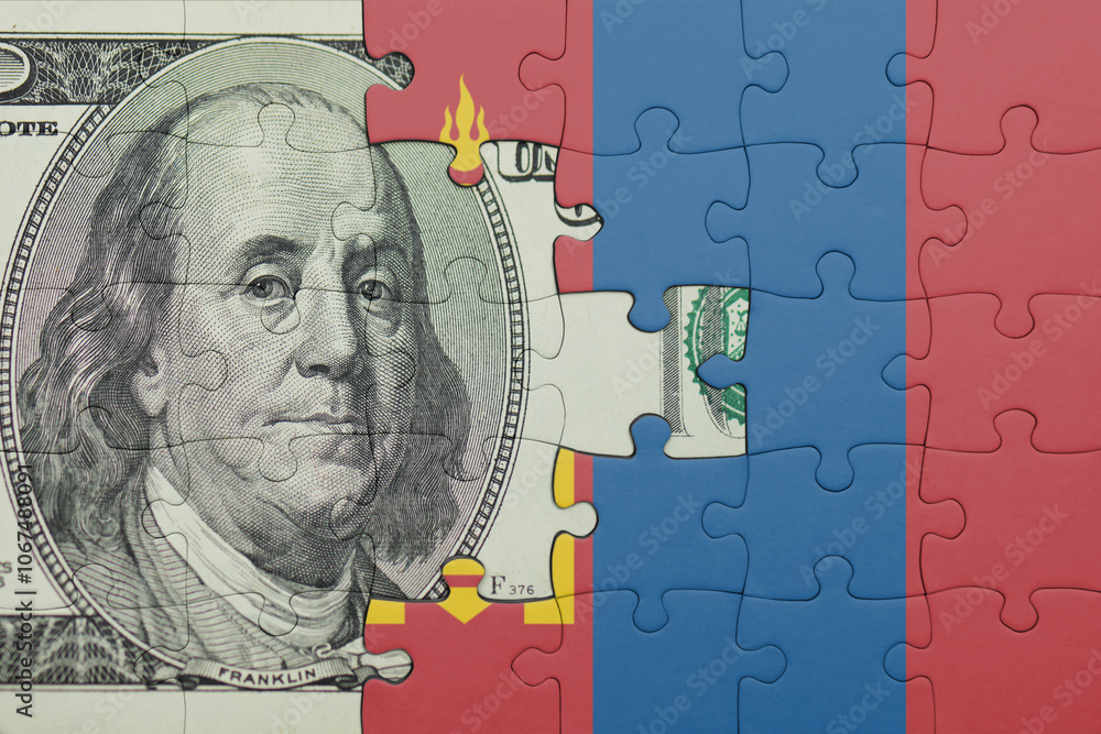 puzzle with the national flag of mongolia and the usa dollar money .finance concept puzzle with the national flag of mongolia and the usa dollar money .finance concept