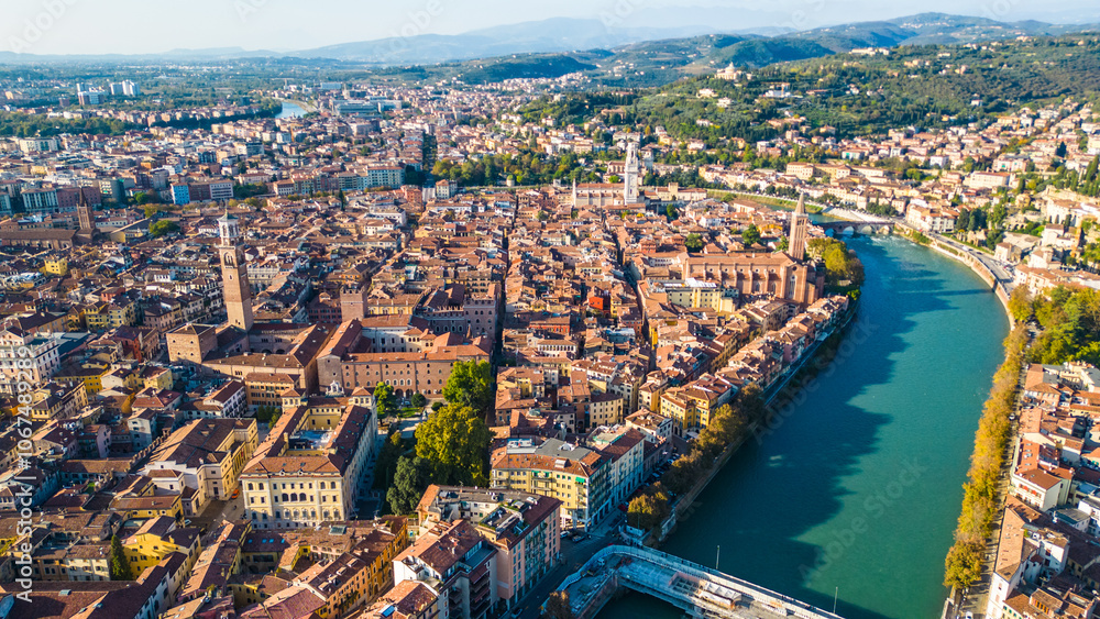 Fototapeta premium Verona, a beautiful and historic city in northern Italy, shines under sunny skies. Known as the city of Romeo and Juliet, Verona attracts tourists with its rich cultural heritage, charming streets