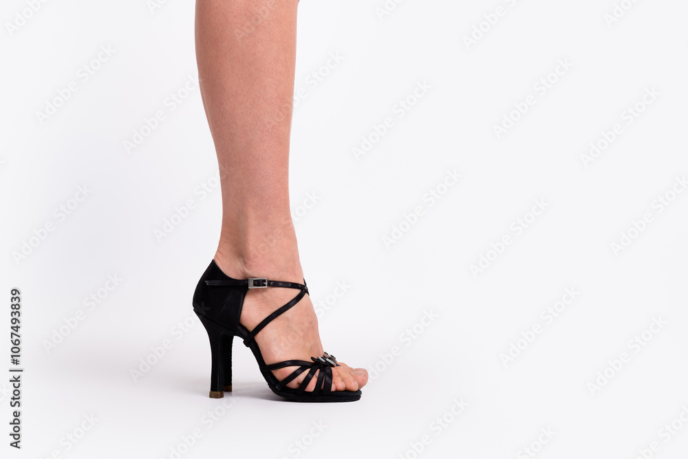 Cropped profile photo of attractive woman legs show black high heel shoes posing model shopping isolated on white color background Cropped profile photo of attractive woman legs show black high heel shoes posing model shopping isolated on white color background