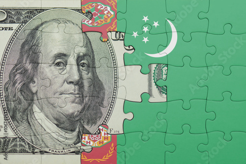 Wallpaper Mural puzzle with the national flag of turkmenistan and the usa dollar money .finance concept Torontodigital.ca
