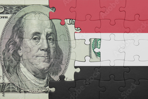 Wallpaper Mural puzzle with the national flag of yemen and the usa dollar money .finance concept Torontodigital.ca