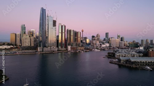 Wallpaper Mural Sydney, Australia; Aerial drone footage of the modern Darling harbor in Sydney with the business district skyline in Australia largest city at sunset Torontodigital.ca