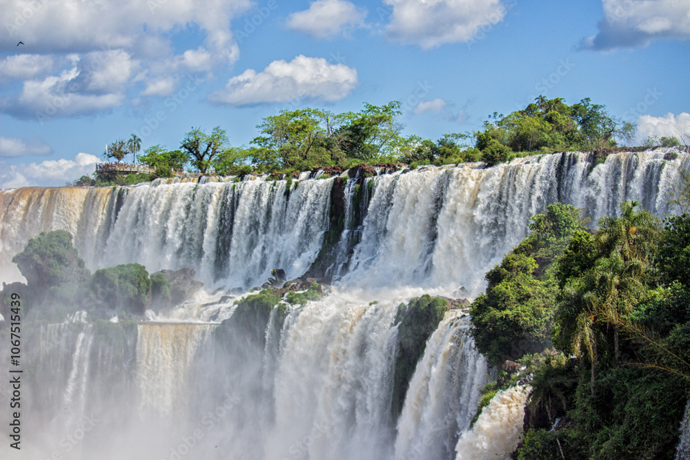 Waterfalls at Iguazu Falls on a sunny day, Misiones, Argentina Waterfalls at Iguazu Falls on a sunny day, Misiones, Argentina