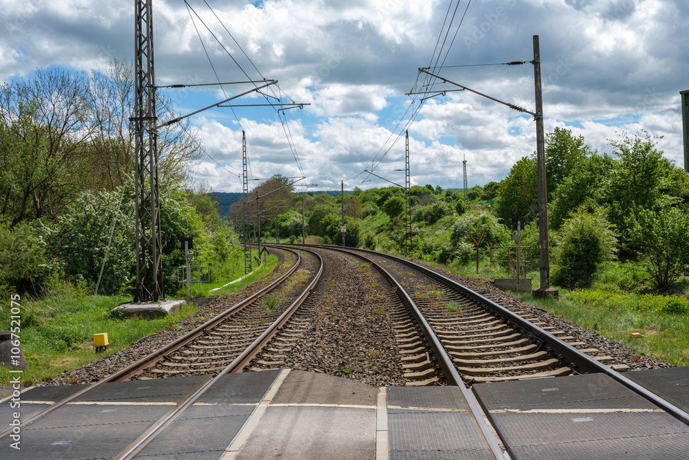 Railway outdoors on beautiful summer day. Industrial landscape with rails and railway.