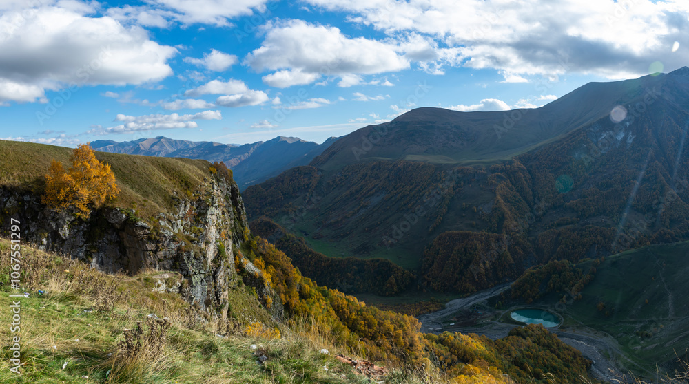 Panoramic landscape view, autumn in caucasus mountains, snow covered mountain peak in sunny day, Georgia Panoramic landscape view, autumn in caucasus mountains, snow covered mountain peak in sunny day, Georgia