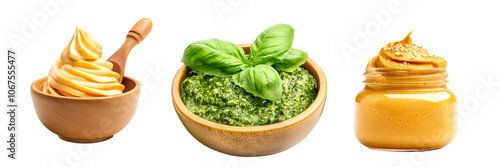 Creamy mayonnaise, mustard and green pesto garnished with fresh green herbs, making it perfect for dips or sauces, isolated on white transparent background.