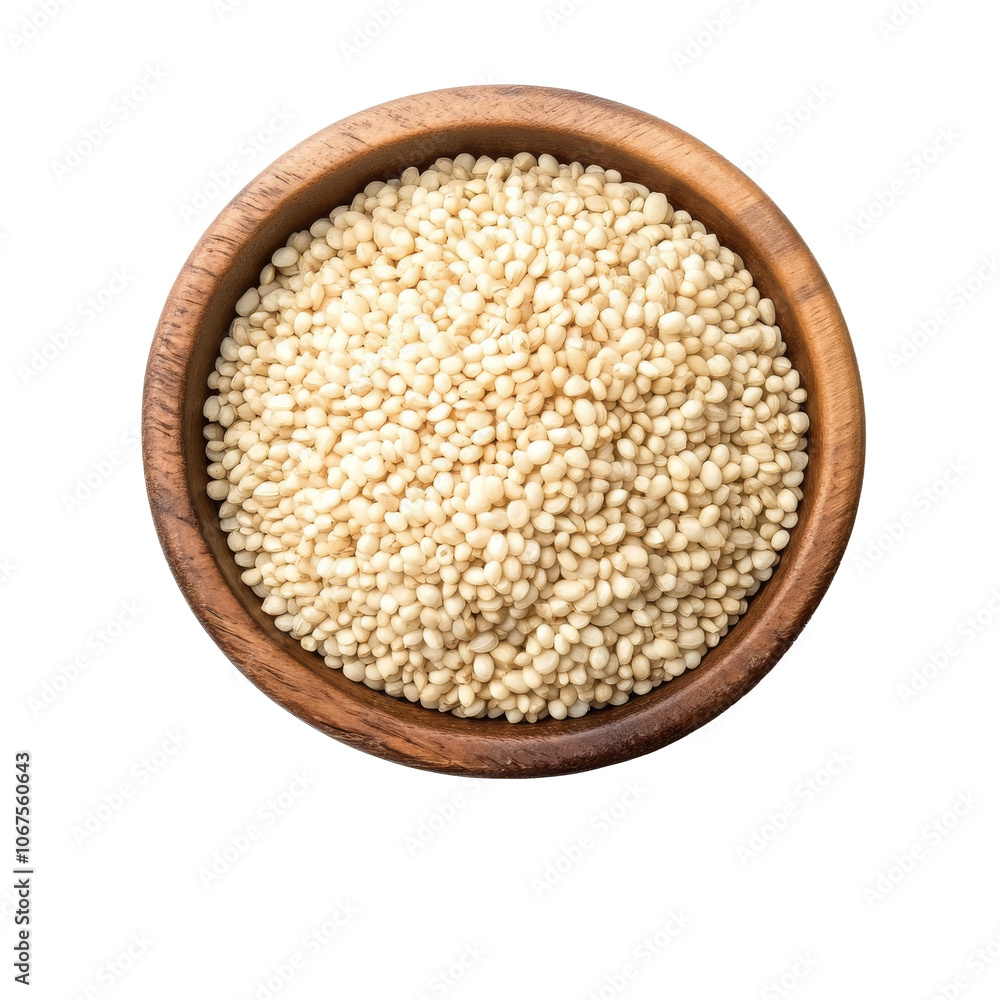 White quinoa seeds in a rustic wooden bowl White quinoa seeds in a rustic wooden bowl