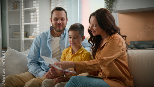 Картината върху платно Happy Caucasian family mother father mom dad parents beloved son kid boy receive