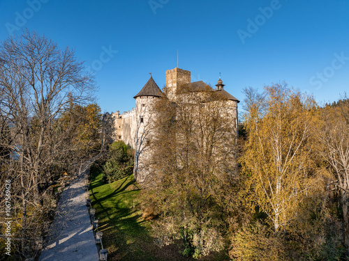 Obraz na płótnie Poland. Medieval castle in Niedzica, dating to 14th century (upper castle) in autumn in October. Trees in beautiful fall colors. Sunset light. Aerial drone view w salonie