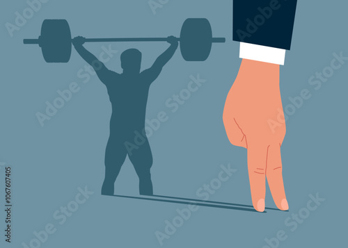 Dreams of becoming a weightlifting. Hand throws away shadow at his strong athlete weight lifting with barbell.  