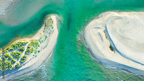 Overhead view of the beautiful El Soldado estuary in San Carlos Sonora, Mexico. The blue-green tones create a unique paradisiacal scenery where sand, mangrove, salt and fresh water come together.