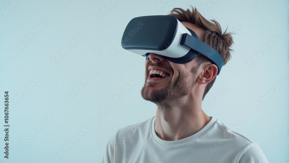 Joyful man immersed in virtual reality while enjoying a new gaming experience indoors Joyful man immersed in virtual reality while enjoying a new gaming experience indoors