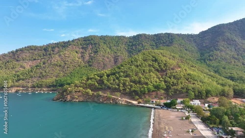 Wallpaper Mural Camera slowly pans to the right, revealing a beautiful mediterranean coastline with turquoise waters and lush green trees Torontodigital.ca