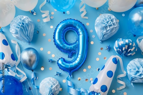 Blue birthday celebration with number nine balloon and party decor photo