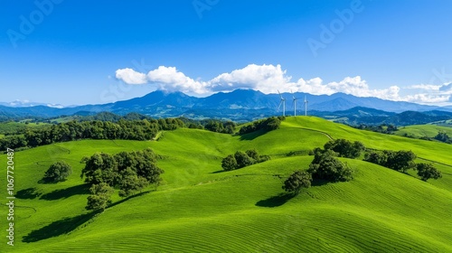 Background of clear blue skies with a large field of wind turbines