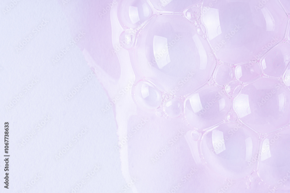 Clear pink cosmetic gel with molecule bubbles on white background Clear pink cosmetic gel with molecule bubbles on white background
