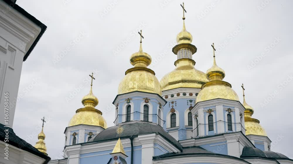 ukraine Kyiv summer august 2, 2024 sophia kiev bell tower golden cupola with painting of saints facade of building main gate ancient architecture ukraine Kyiv summer august 2, 2024 sophia kiev bell tower golden cupola with painting of saints facade of building main gate ancient architecture