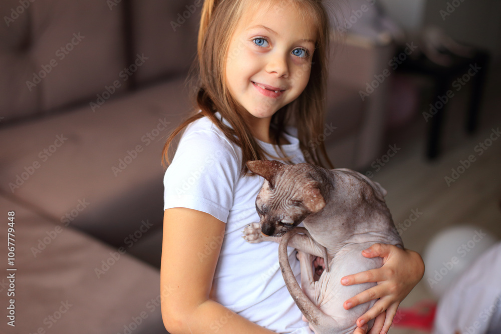 A joyful scene of a young girl playing with her adorable Sphynx cats. The unique, hairless cats are playfully interacting with her, creating a delightful atmosphere filled with laughter and affection. A joyful scene of a young girl playing with her adorable Sphynx cats. The unique, hairless cats are playfully interacting with her, creating a delightful atmosphere filled with laughter and affection.