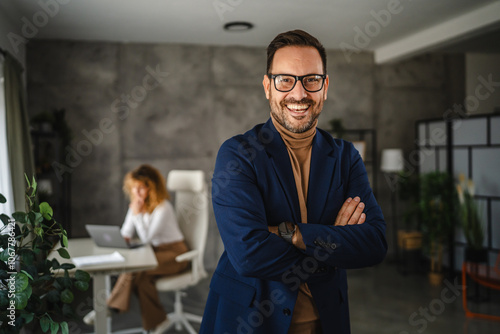 Wallpaper Mural Portrait of adult man businessman stand with arm crossed in the office Torontodigital.ca