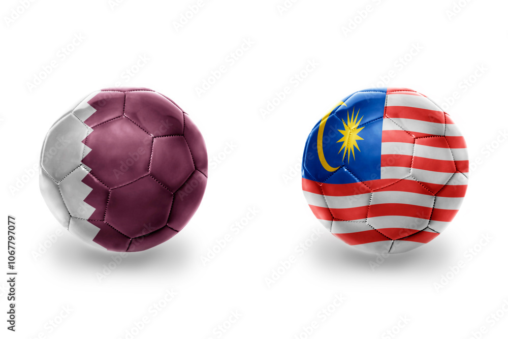 Obraz premium football balls with national flags of malaysia and qatar ,soccer teams. on the white background.