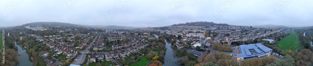 Fototapeta premium Aerial Panoramic View of Historical Walcot Bath City of England Which is Located in North East of Somerset, United Kingdom. High angle Footage Was Captured During Mostly Cloudy Early Morning