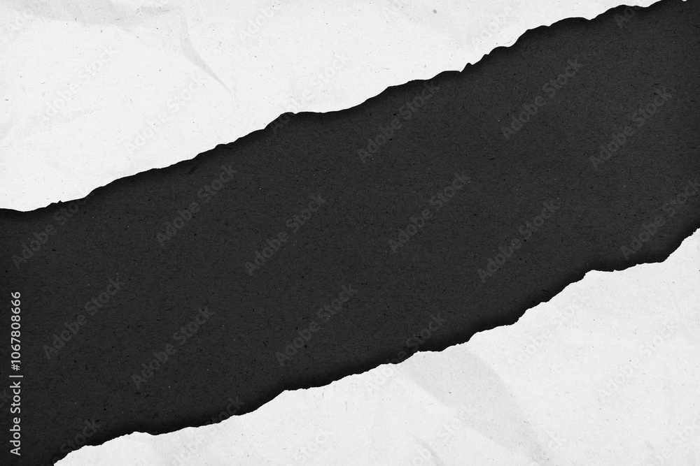 Top view of white ripped paper with black background Top view of white ripped paper with black background
