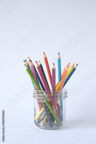 Coloring pencils in all the colours of the rainbow.