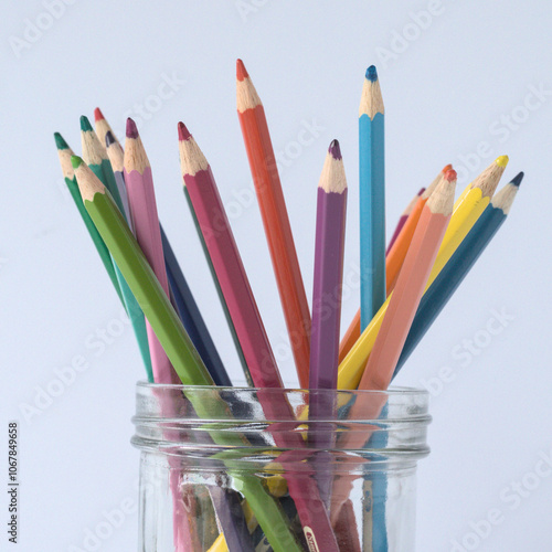 Coloring pencils in all the colours of the rainbow.