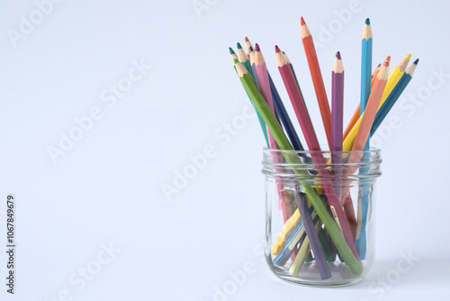 Coloring pencils in all the colours of the rainbow.