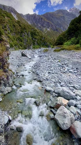 The stream running through rocks at the Red Tarns track in Mt. Cook National Park, New Zealand.