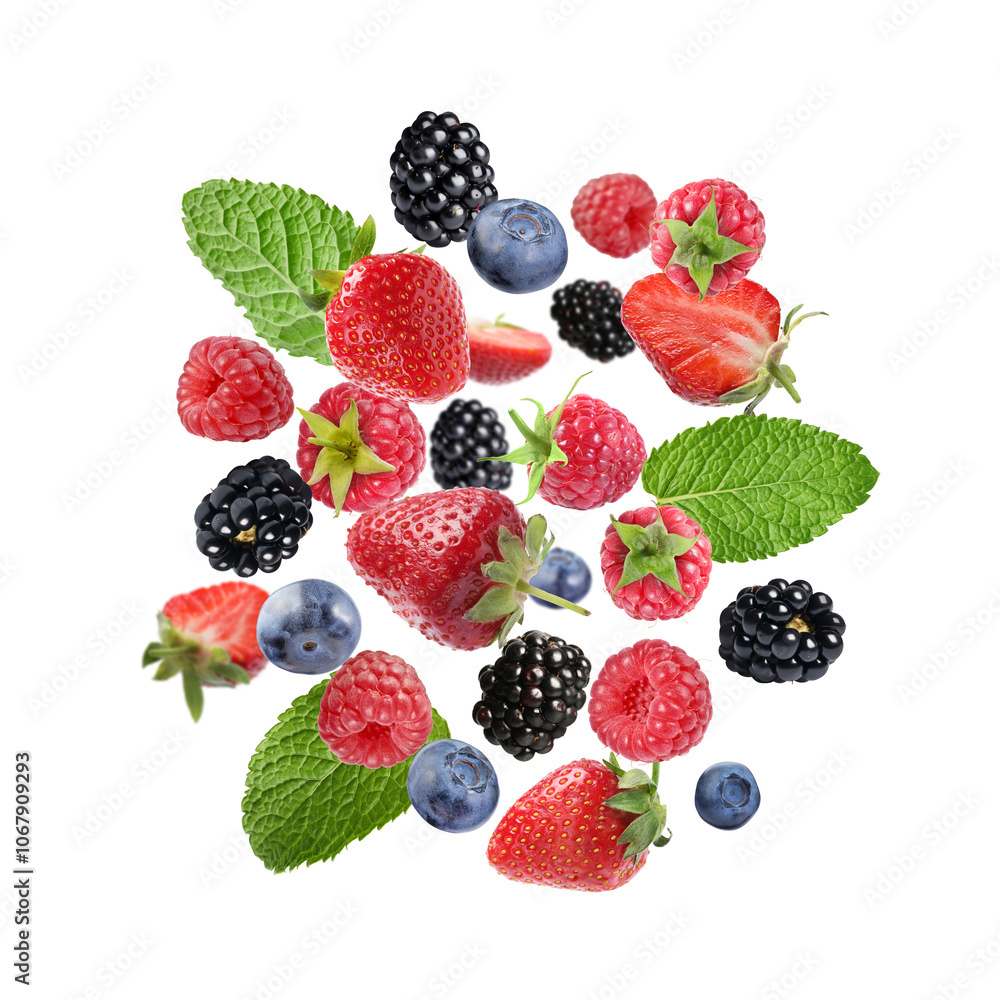 Mix of fresh berries in air on white background Mix of fresh berries in air on white background