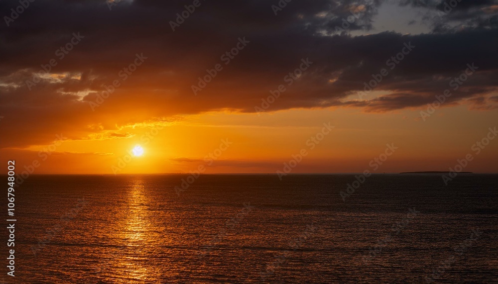 Obraz premium A big sun rises under the dark sky