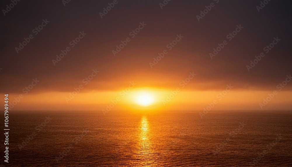 Fototapeta premium A big sun rises under the dark sky