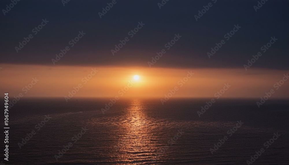 Fototapeta premium A big sun rises under the dark sky