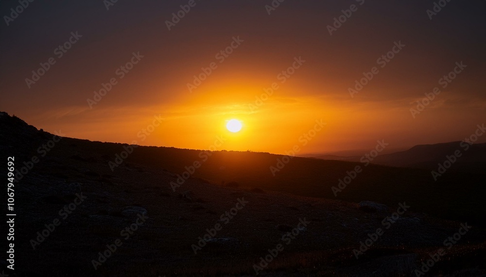 A big sun rises under the dark sky A big sun rises under the dark sky